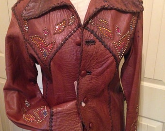 REDUCED!! 1974 North Beach Leather jacket with lotus design in studs & crystals