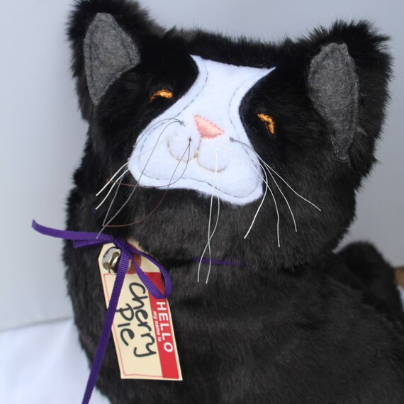 stuffed tuxedo cat