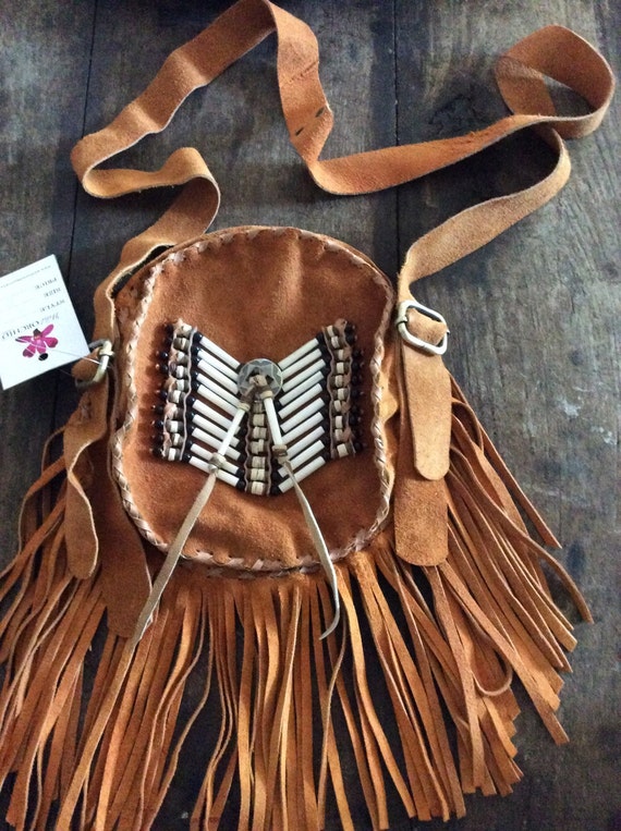 Round suede fringe bags