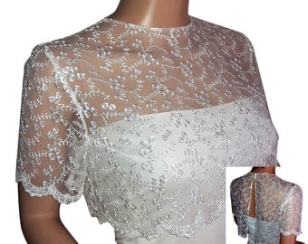 Bridal lace bolero in white or Ivory with a cropped top and a split back . sizes UK 8 to 18