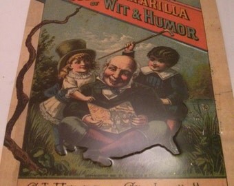Vintage Collection - Sarsaparilla Book of Wit and Humor Metal Tin Sign Reproduction