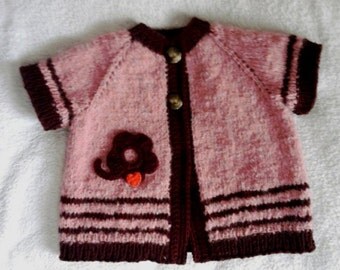 Hand made knitted tunic-vest for girls.