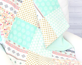 Tess's Tribal Coral, Mint, and Gold Baby Quilt