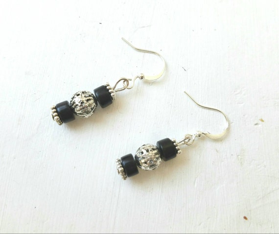 Items similar to Silver Filagree and Black Beaded Earrings on Etsy