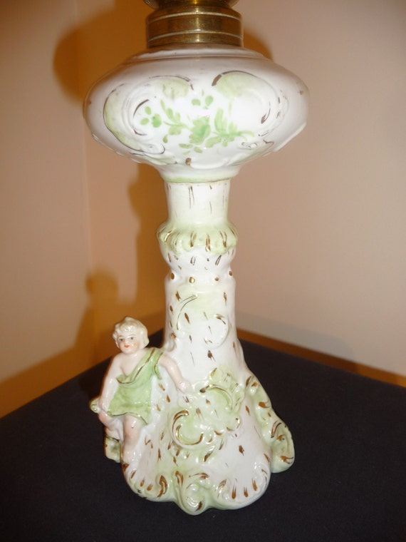 Antique cherub porcelain oil lamp The P&A MFG Co Victor