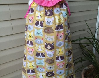 Adorable ruffler dress with cat material