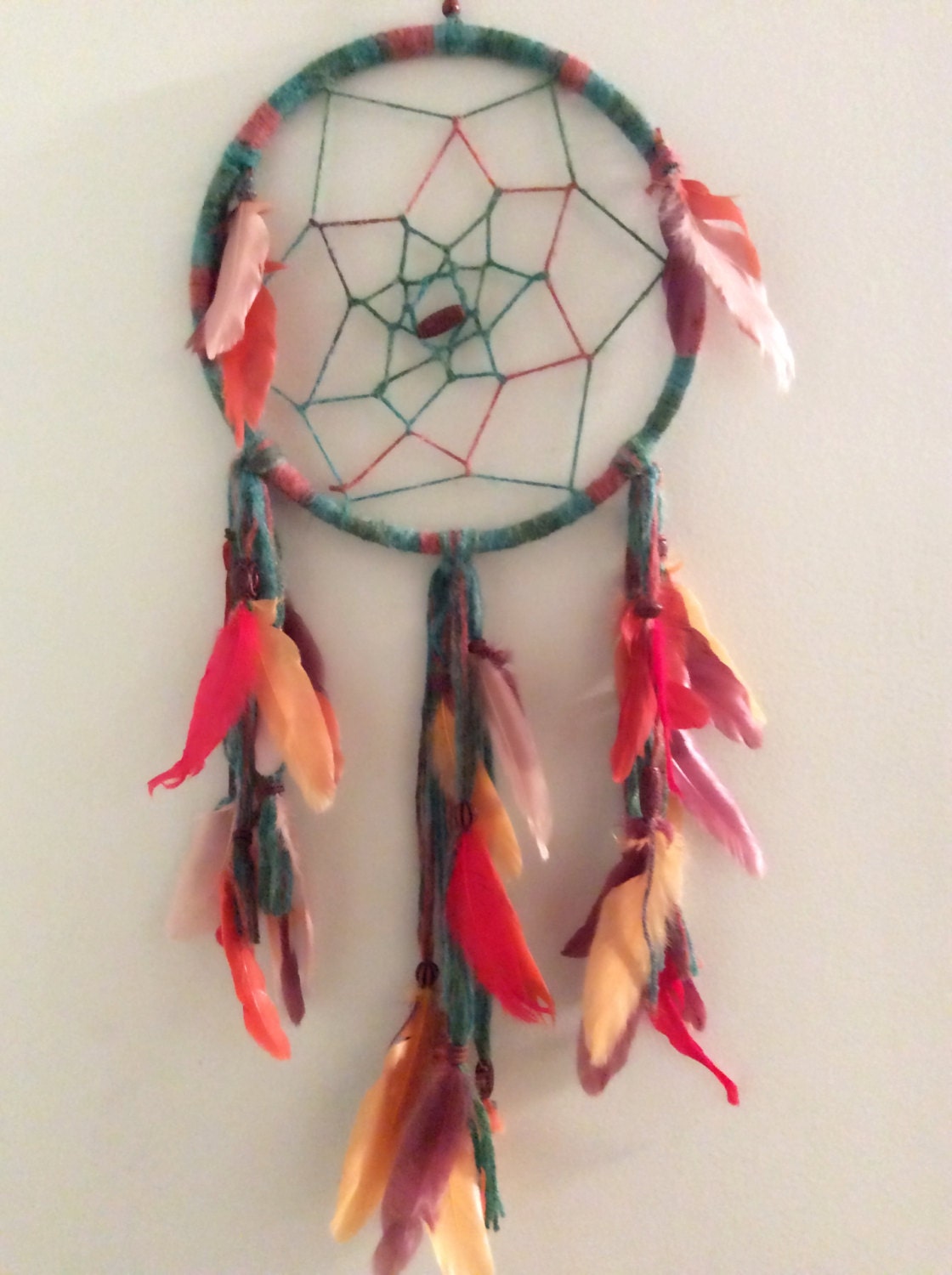 Yarn and feathers dream catcher. Dream catcher. Boho decor.