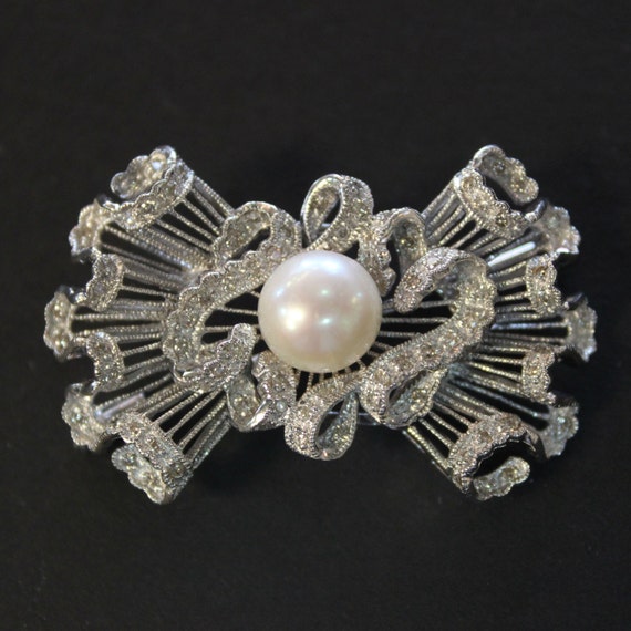 Vintage Designer Bow Brooch - Over 2 Carats of Diamonds, Pearl, 18k white gold circa 1971.