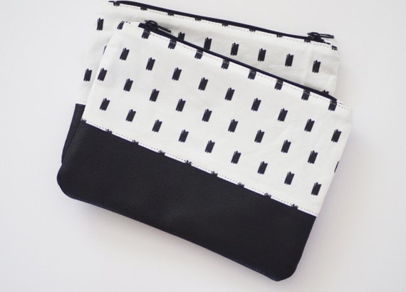 Printed canvas and cowhide leather zippered pouch