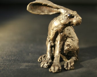 Tiny Bronze turning Hare Sculpture By Paul Jenkins