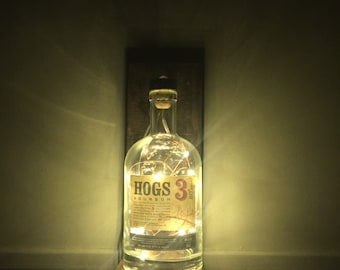 Lights in bottle sconce
