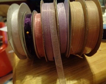 7 partial spools of 1/4 inch organza ribbon