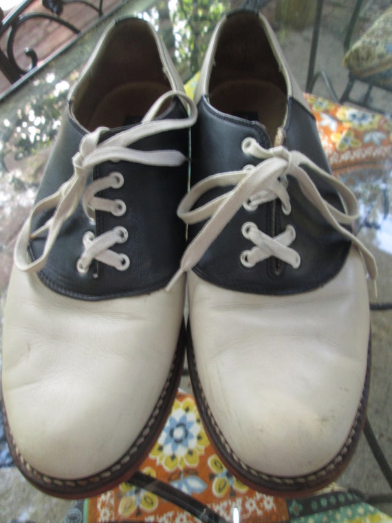 Vintage Tommy Hilfiger black and beige saddle shoes. Made in Vintage Tommy Hilfiger black and beige saddle shoes. Made in