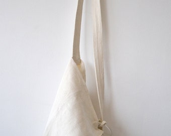 white canvas shoulder bag