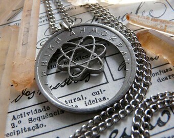 Items similar to GREECE - cut coin pendant - A