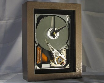 Engineer or Teacher gift for anyone who works on computers. Techie/Display/Desktop/Mantel/Steampunk clock made from a computer hard drive
