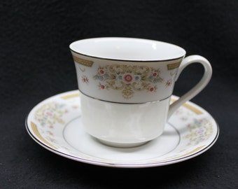 plastic tea cup and saucer set