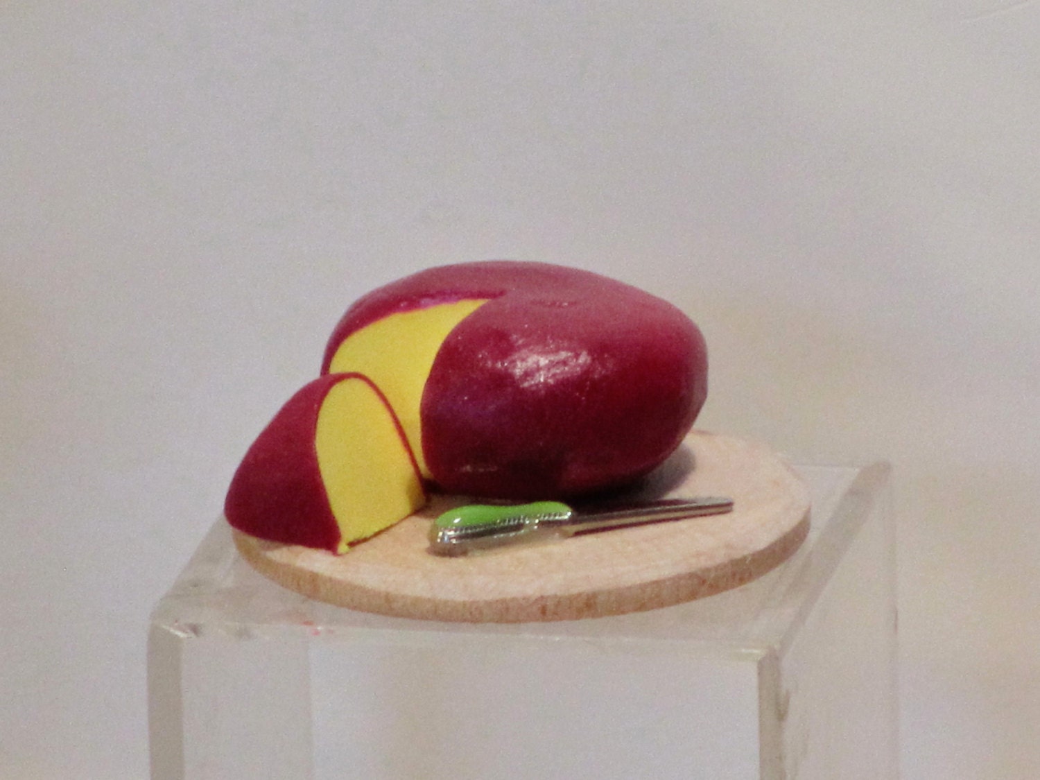 Miniature handmade Cheddar Cheese wheel