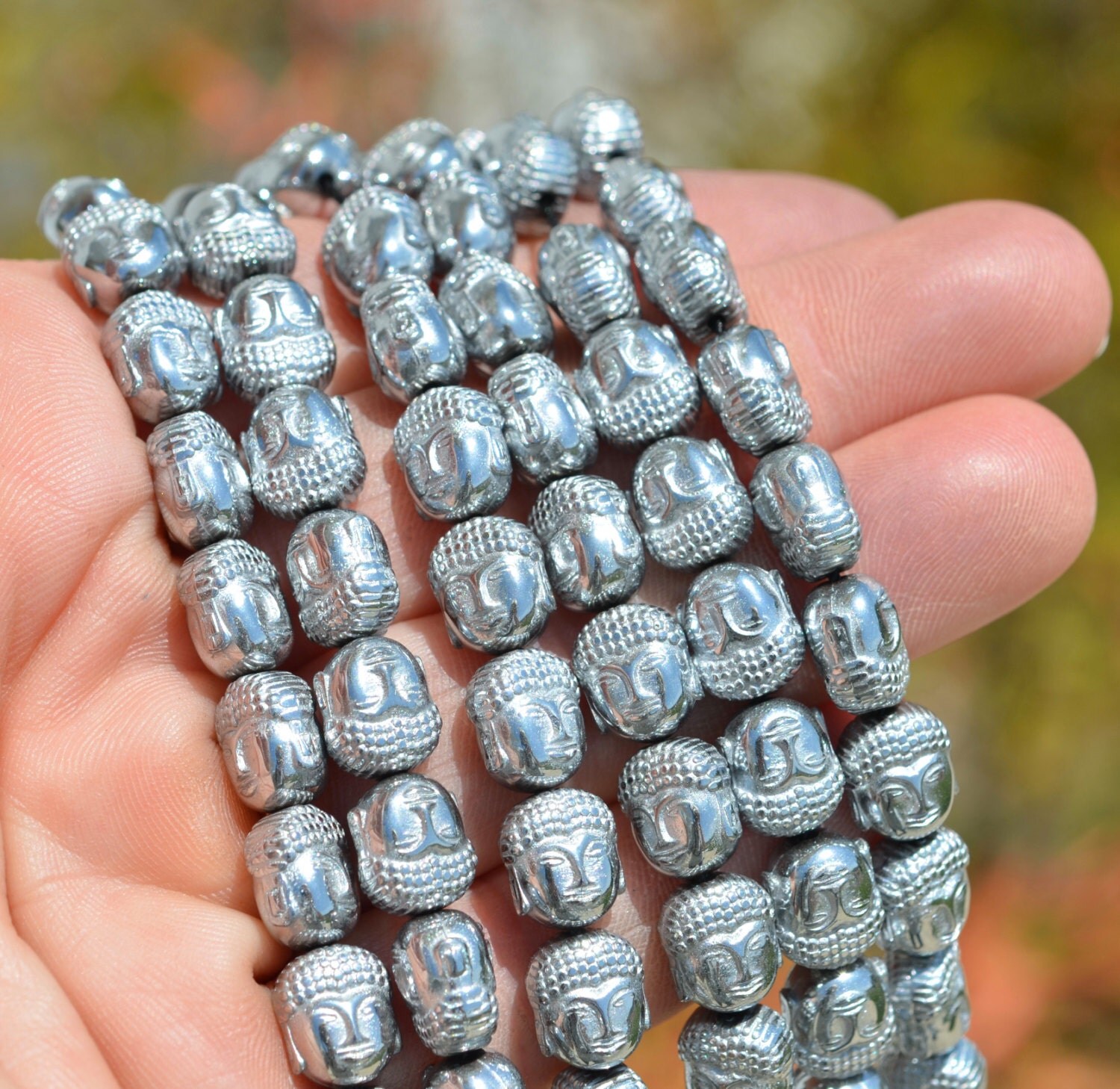 19 Silver Hematite Buddha Beads BD979