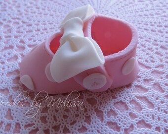 Pair of fondant baby shoes (EDIBLE)