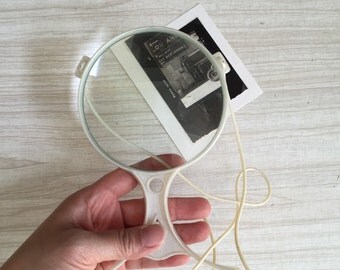 vintage large white magnifying glass