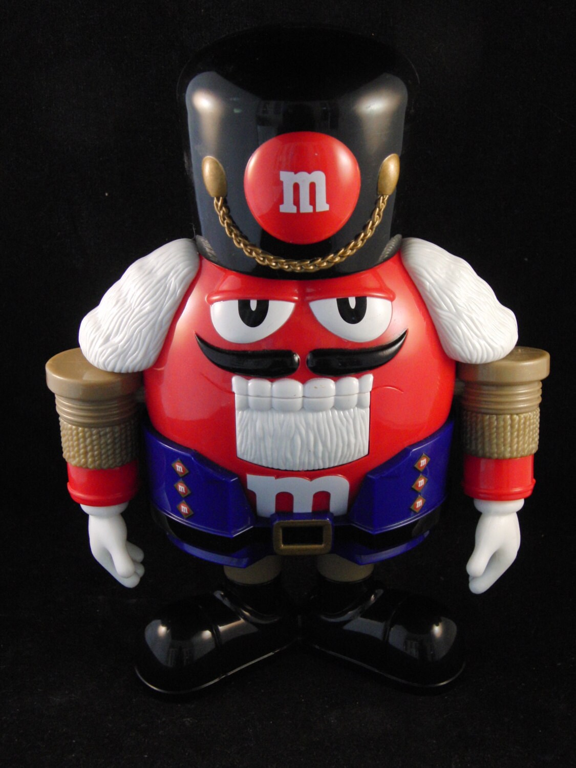 Red M&M nutcracker candy dispenser