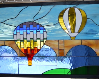 Stained glass balloons over London Bridge