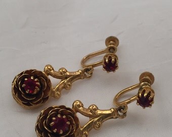 Vintage drop earrings, gold tone metal, red rhinestones, screw back