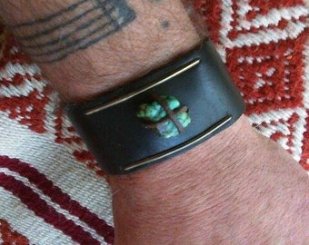 Silver, leather and stone