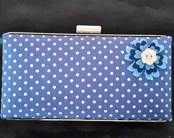 navy and white polka dot clutch bag