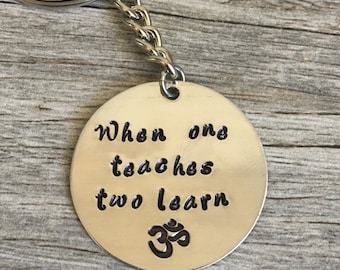 gift for yoga teacher, yoga, yoga quote, namaste, om, yogi, yoga gifts, yoga gift for teacher, when one teaches two learn, yoga accessories