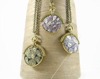 Liberty of London Grayson Perry "Cranford" print fabric set in solid brass replica vintage fob pendant