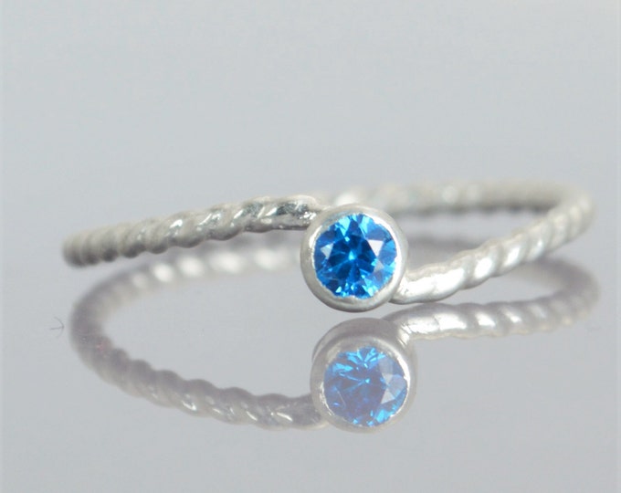 Wave Ring, Silver Wave Ring, Blue Zircon Mothers Ring, December Birthstone Ring, Silver Twist Ring, Unique Mother's Ring, Blue Zircon Ring