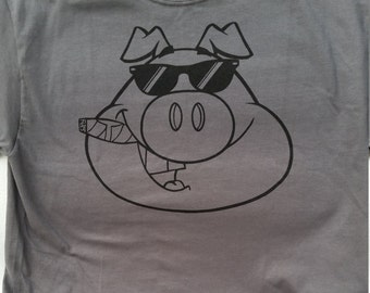 Cigar Smoker Pig, on a charcoal gray colored high quality Gildan brand Ultra 100% cotton crew neck tee shirt