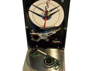 A "Head Crash" Disk Platter Accents this Computer Hard Drive now a Desk Clock.