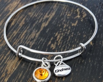 Items similar to Mixed Metal Layered Kindness Bracelet on Etsy