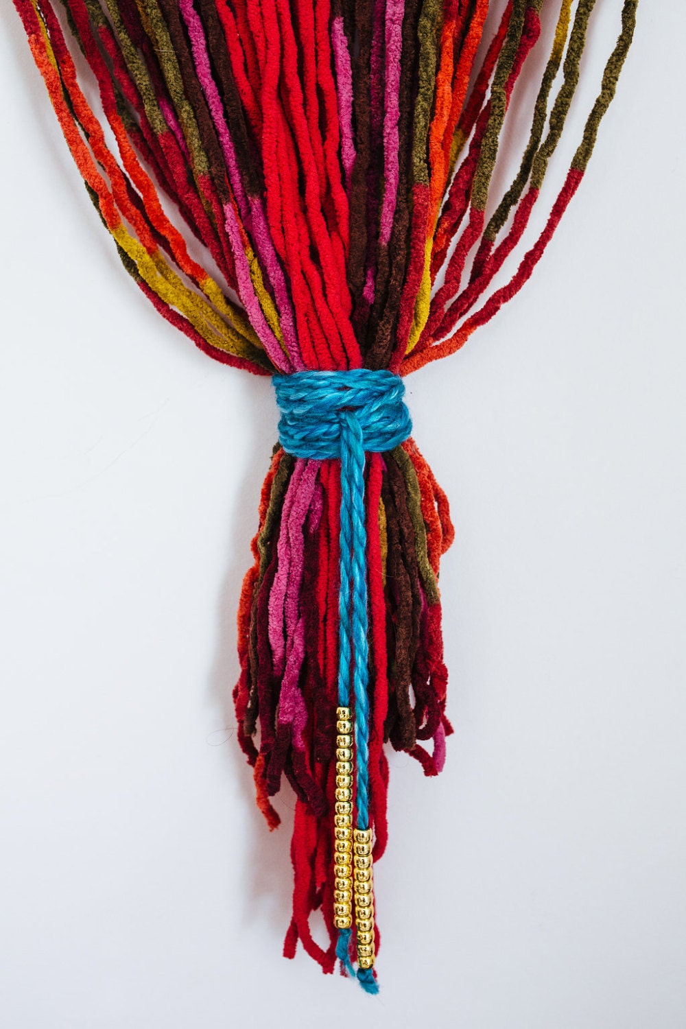 MultiColored Yarn & Branch Wall Hanging