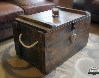 storage chest coffee table. 2 plank lid design. rough sawn storage chest coffee table. 2 plank lid design. rough sawn