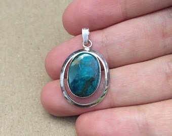 Sterling silver pendant with oval shaped turquoise, stamped 925