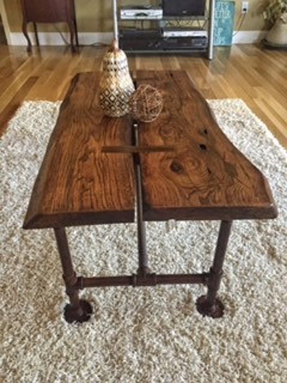 Items similar to Reclaimed oak live edge table with steel industrial base. on Etsy