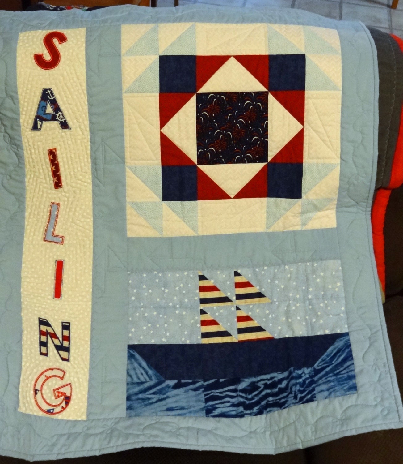 Quilt with ship and SAILING letters in applique measuring 39