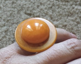 marbled peachy orange bakelite ring with adjustable band