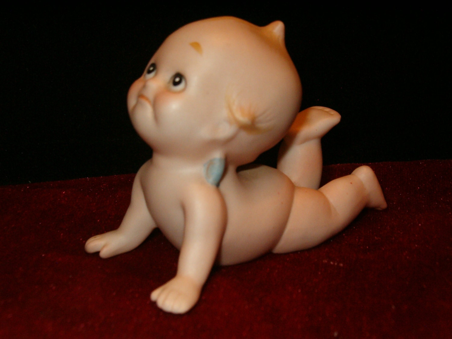 porcelain kewpie doll