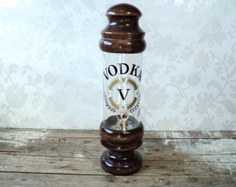 Liquor Dispenser, vintage vodka bottle, tap, wood trim, barware, glass, bar accessory, decanter