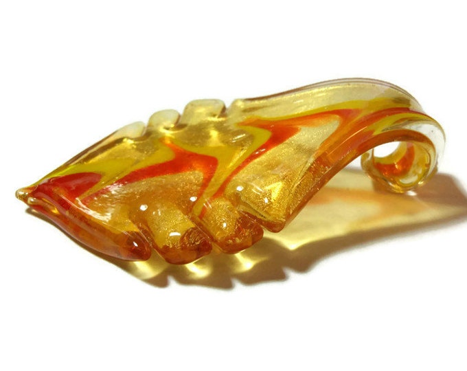 Large lampwork pendant, bright yellow and reddish orange design on a golden yellow background leaf, 60mm X 38mm