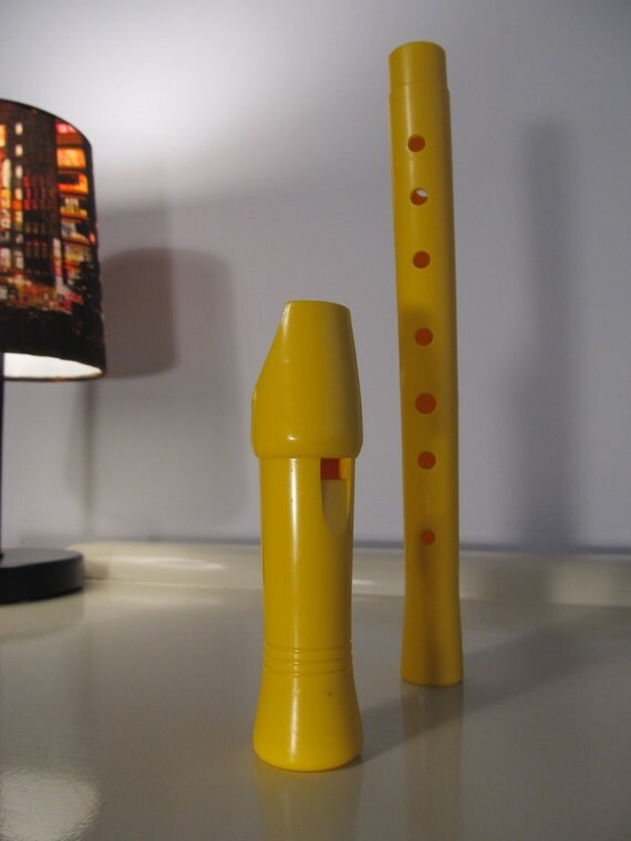 Items similar to Reserved *** Vintage Bright Yellow Flute Toy made of Hard Plastic on Etsy