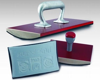 Rubber stamp roller mounts, custom rubber stamps. Branding business logo with artwork and designs with larger roller, rocker mounts.