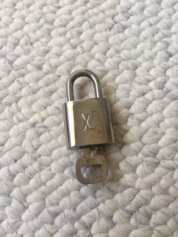 Louis Vuitton padlock and one key 445 bag charm lock silver