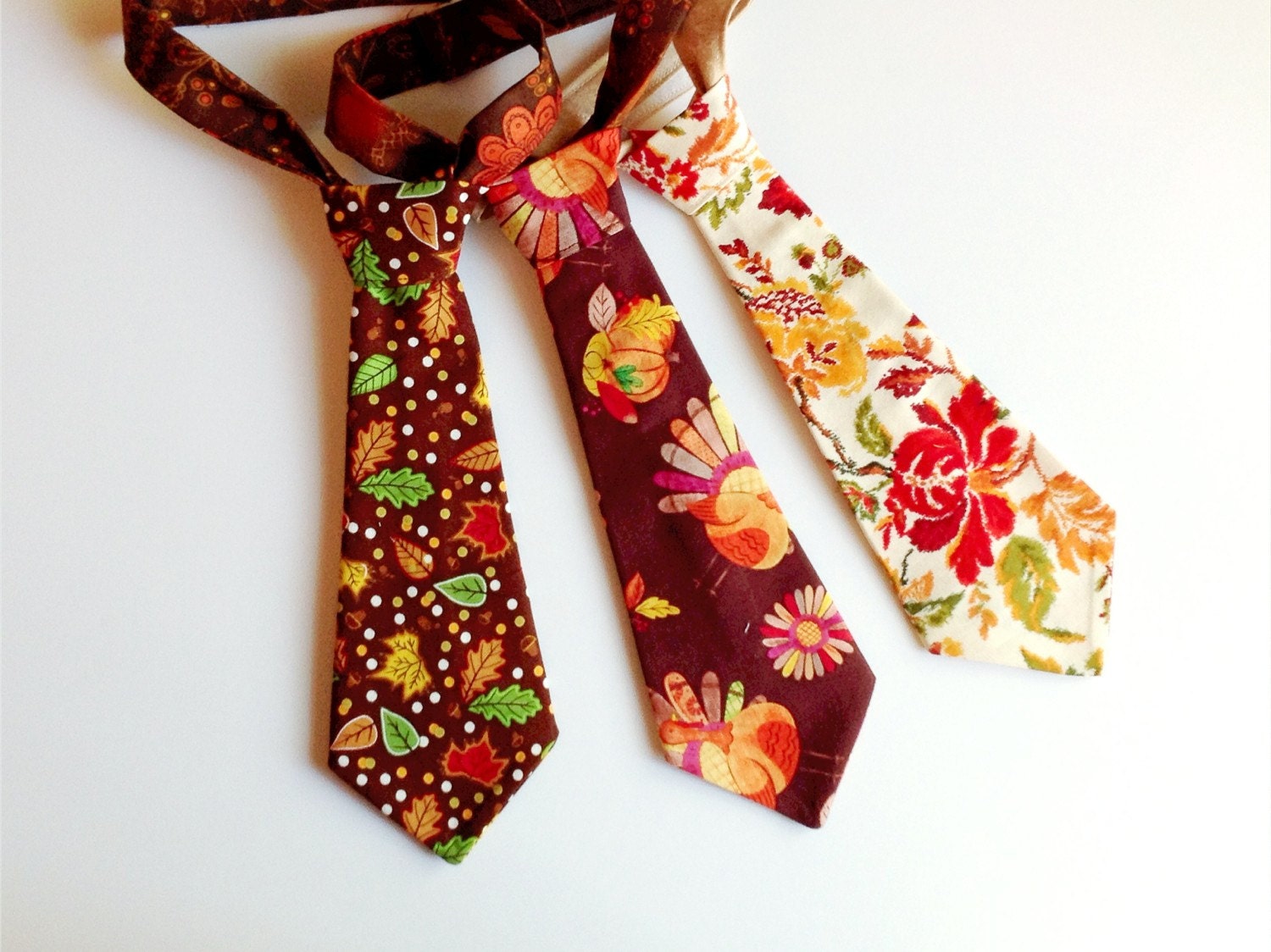 Fall and Thanksgiving Ties ranging in sizes from newborn to