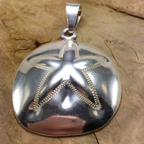 Sterling Silver Sand Dollar Pendant / by SusansEstateJewelry